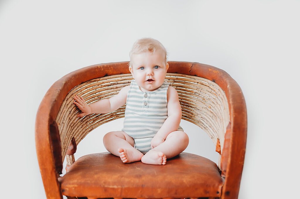 Fort Worth Baby Photography - baby sitting in brown chair